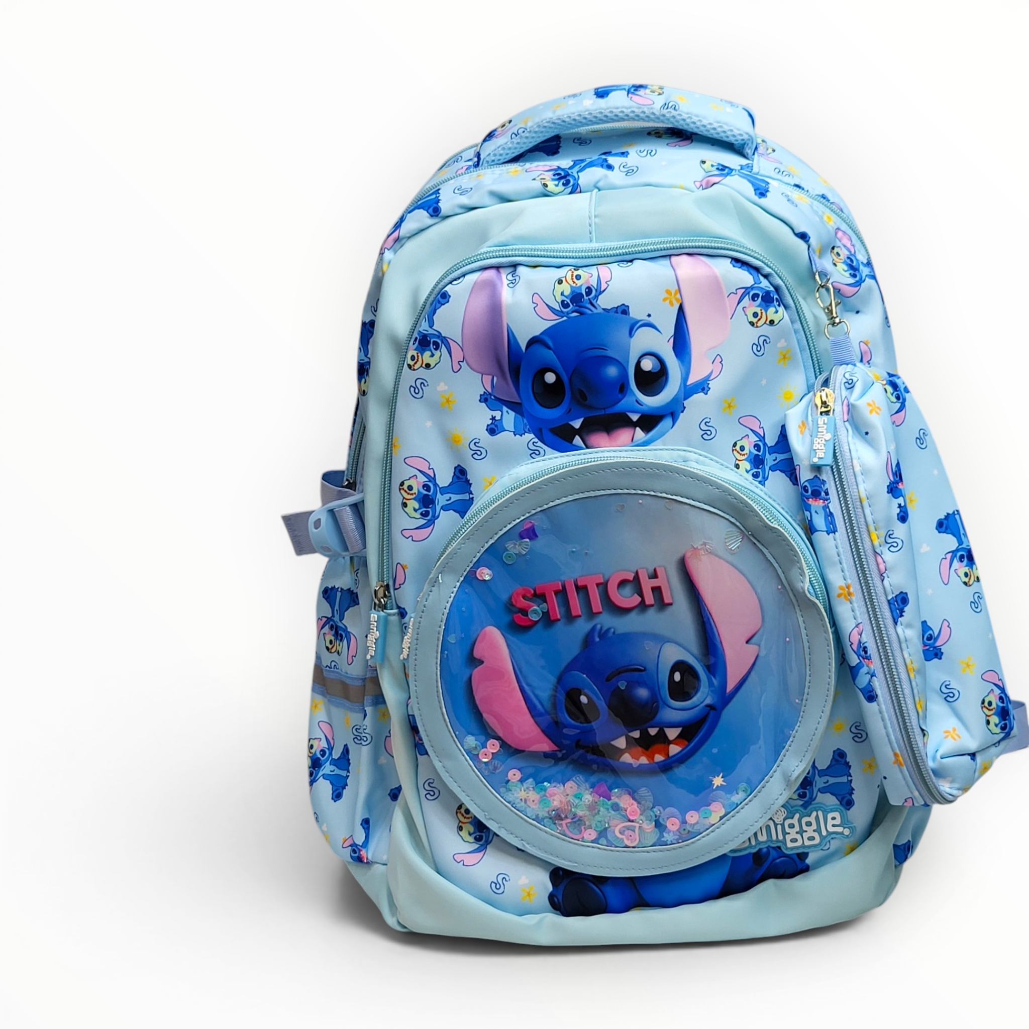 Front view of a light blue Smiggle Disney Stitch kids backpack showing the circular sequin shaker front pocket and an attached matching pencil pouch.