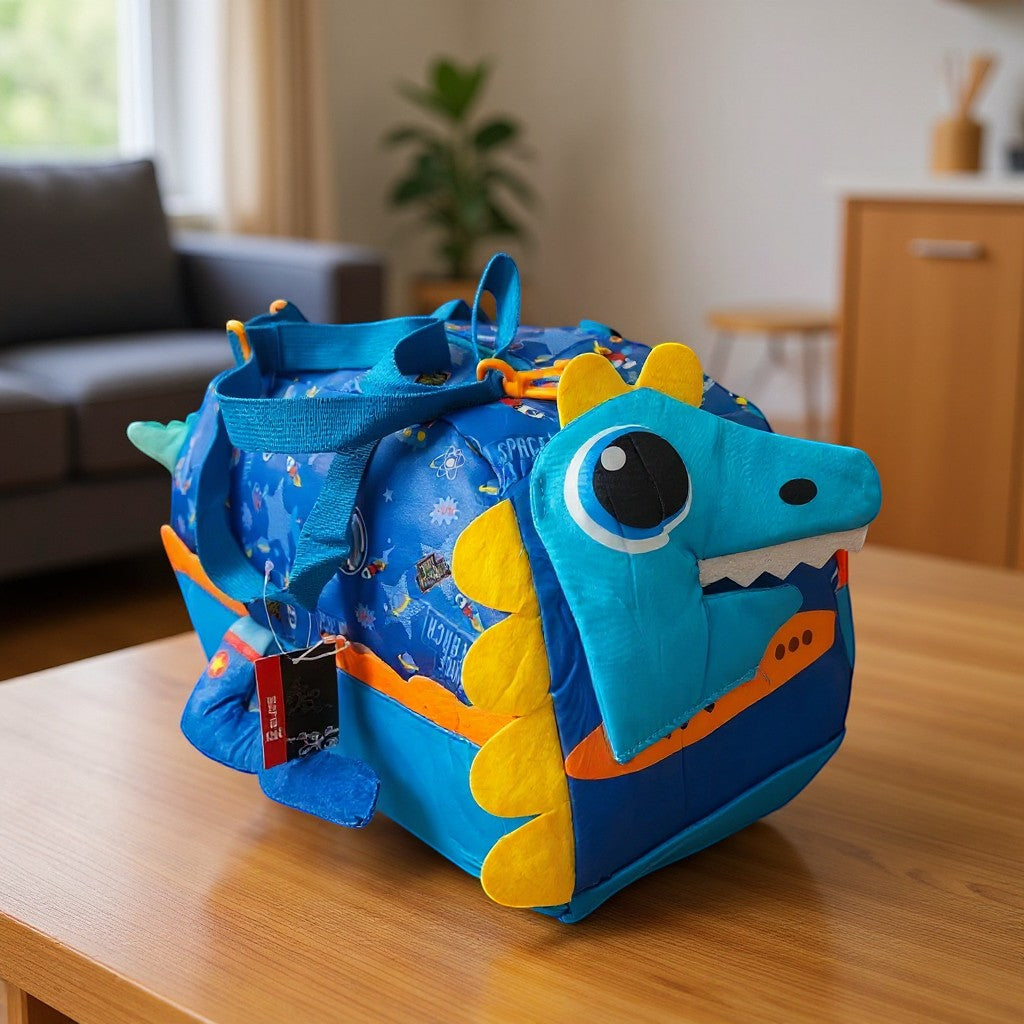 Tiny Tokens blue polyester duffle bag with space print, 3D dinosaur face, yellow spikes, and rocket pockets.