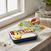 Tiny Tokens blue 5-section stainless steel lunch box with yellow accents and separate curd cup. Leak-proof design for kids.