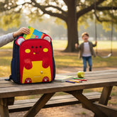Tiny Tokens navy blue polyester backpack with a cute red and yellow cartoon bear face, 3D ears, and bee detail. Ideal for boys and girls.