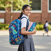 Tiny Tokens navy blue kids backpack with all-over dinosaur print and matching pencil pouch. Features a cool T-Rex graphic.
