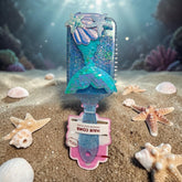 Tiny Tokens blue glitter mermaid tail hair brush with sequin accents and starfish, perfect for kids.