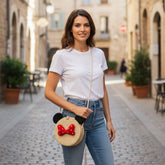 Tiny Tokens beige cotton rope sling bag for girls, inspired by Minnie Mouse with red polka dot bow and black ears.