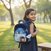Tiny Tokens navy blue polyester kids backpack with cat house design, adjustable straps, and multiple compartments.