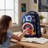 Tiny Tokens navy blue polyester backpack for boys with astronaut and rocket space theme, double compartments, and glitter window.