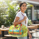 Tiny Tokens neon yellow-green transparent PVC jelly tote bag with rainbow striped handles and piping, featuring front pockets and a detachable sling.