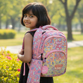 Tiny Tokens pink holographic small school backpack with 'Good Vibes' print and customizable name panel. Includes matching pencil pouch.
