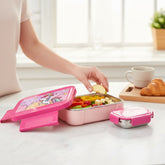 Tiny Tokens pink unicorn lunch box with stainless steel inner tray and mini sauce cup. Features 4 clip locks.