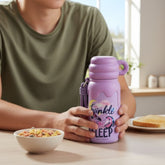 Tiny Tokens purple fantasy steel water bottle with push button lid and carabiner clip, featuring a winged unicorn and stars.