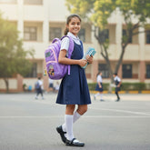 Tiny Tokens purple polyester K-Pop Demon Hunters school backpack with holographic logo and character graphics. Features pink trim, side mesh pockets, and a bonus keychain.