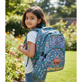 Tiny Tokens teal blue girls backpack with holographic front panel and 'Good Vibes' print. Includes matching pencil pouch and customisable name tag.