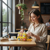 Tiny Tokens yellow EVA kids crossbody bag with bunny ears, cartoon charms, and adjustable strap.