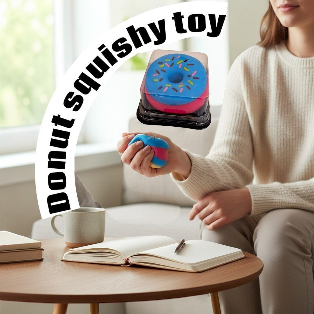 Tiny Tokens blue and pink donut squishy toy held in hand, made of soft silicone for stress relief.