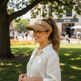 Tiny Tokens brown knit open-top sun visor cap for kids with a cute rabbit badge and ears detail.