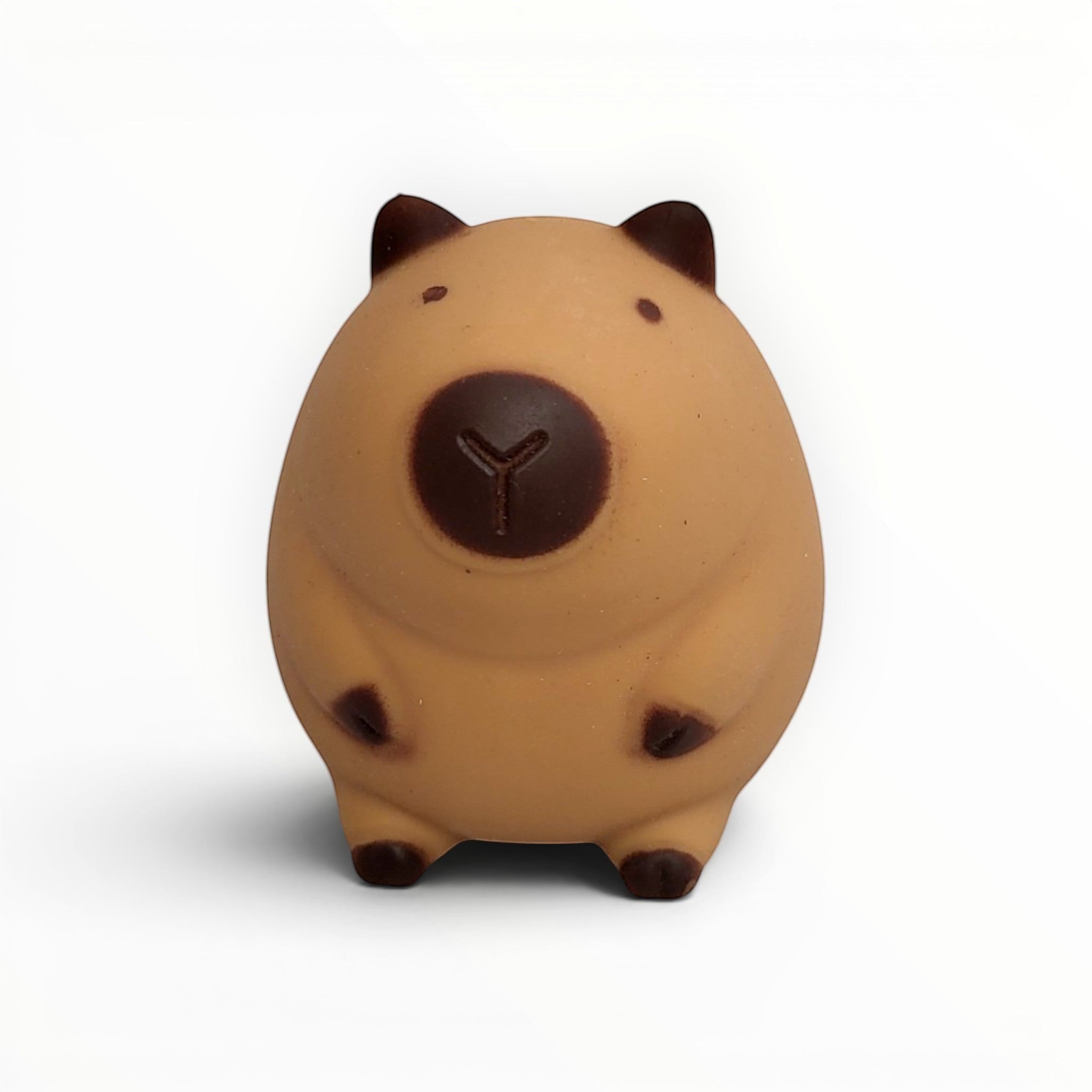 Tiny Tokens brown rubber capybara squeeze toy for kids, a cute and squishy sensory animal for stress relief and fidgeting.