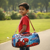Tiny Tokens Kids Spider-Man drum duffle bag with dual carry handles and shoulder strap, featuring a vibrant graphic print.