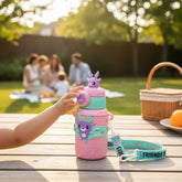 Tiny Tokens pink and teal stainless steel water bottle with 3D deer topper, straw sipper, and adjustable strap for kids.