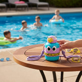 Tiny Tokens blue and purple robot kids steel insulated bottle with goggle eyes and MOCOMOCO band, straw lid, and shoulder strap.