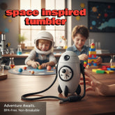 Tiny Tokens grey rocket-shaped water bottle with astronaut detail and black straw and strap. BPA-free plastic.