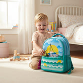 Tiny Tokens sky blue & teal polyester kids backpack with ocean & shark print, 3D appliqué, and padded straps.