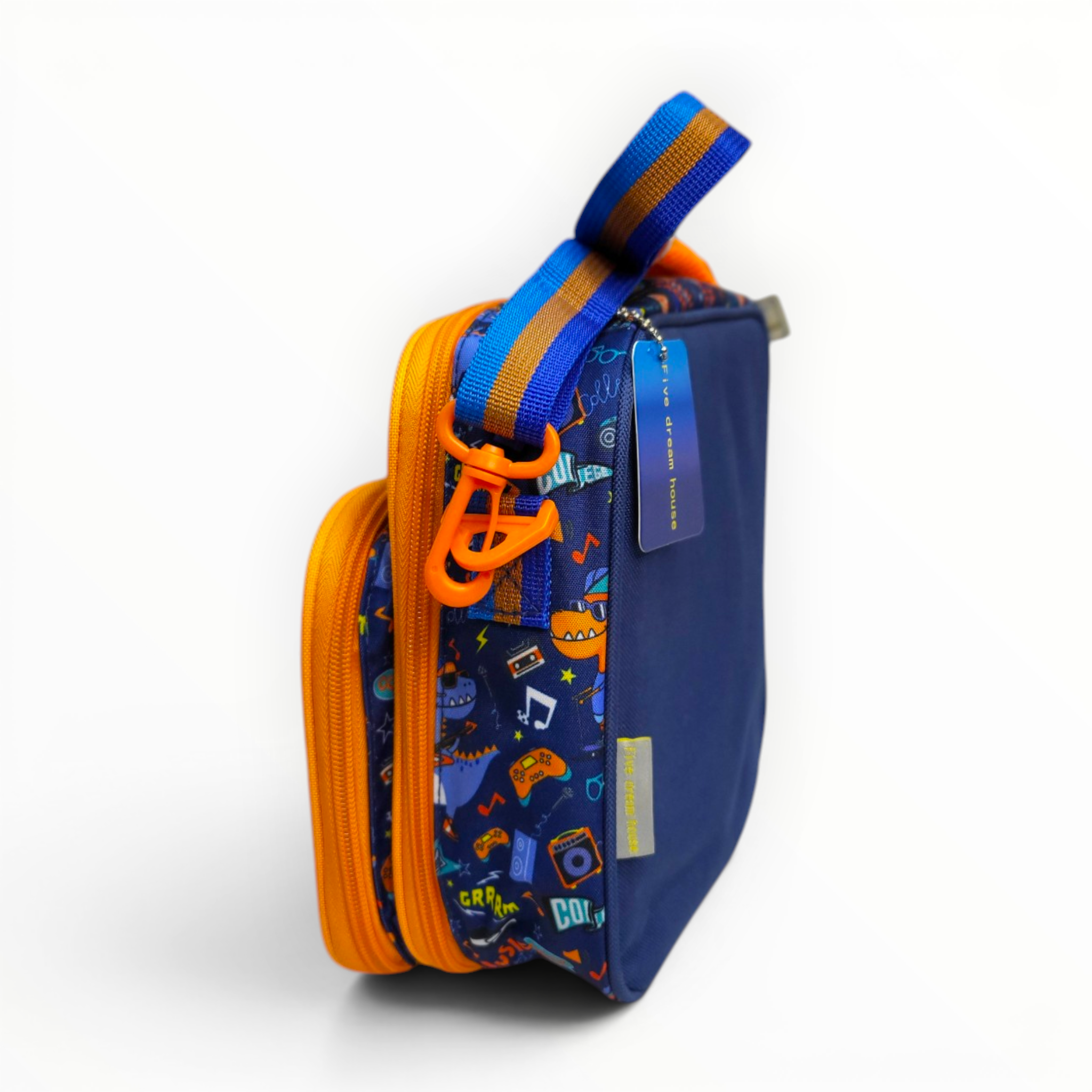 Side view of the blue dinosaur lunch bag showing the thickness of the main compartment, orange zippers, and an attached blue-and-orange striped adjustable shoulder strap.