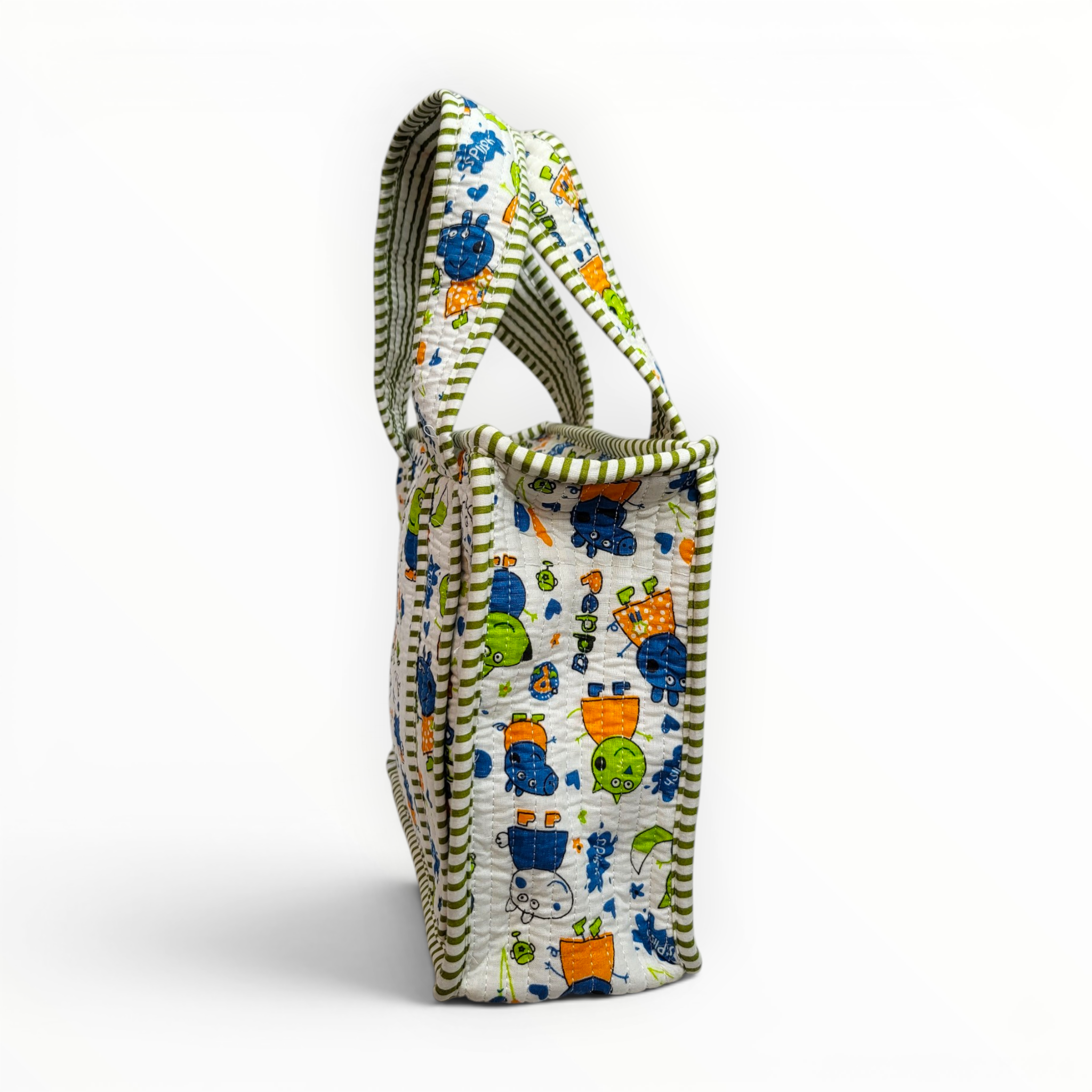 Side view highlighting the wide rectangular profile and uniform quilted pattern of the fabric cartoon character lunch tote.