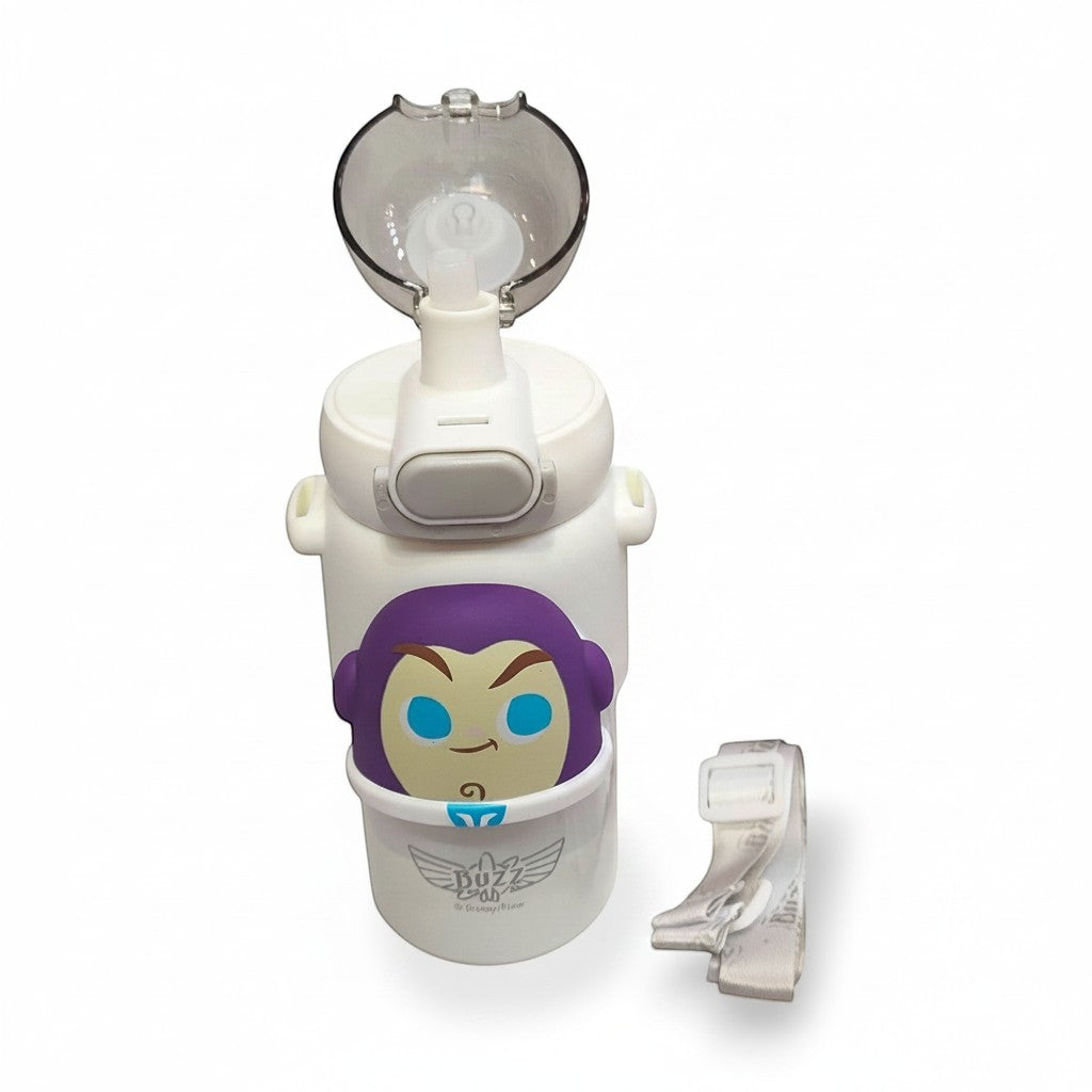 Tiny Tokens white Buzz Lightyear kids water bottle with purple character badge, flip straw lid, and adjustable strap.