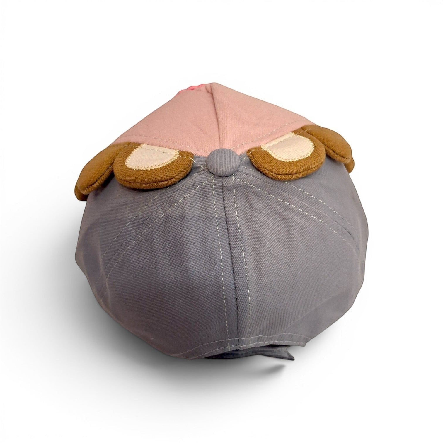 Tiny Tokens pink and grey cotton baseball cap for kids with 3D lion ears and adjustable strap.