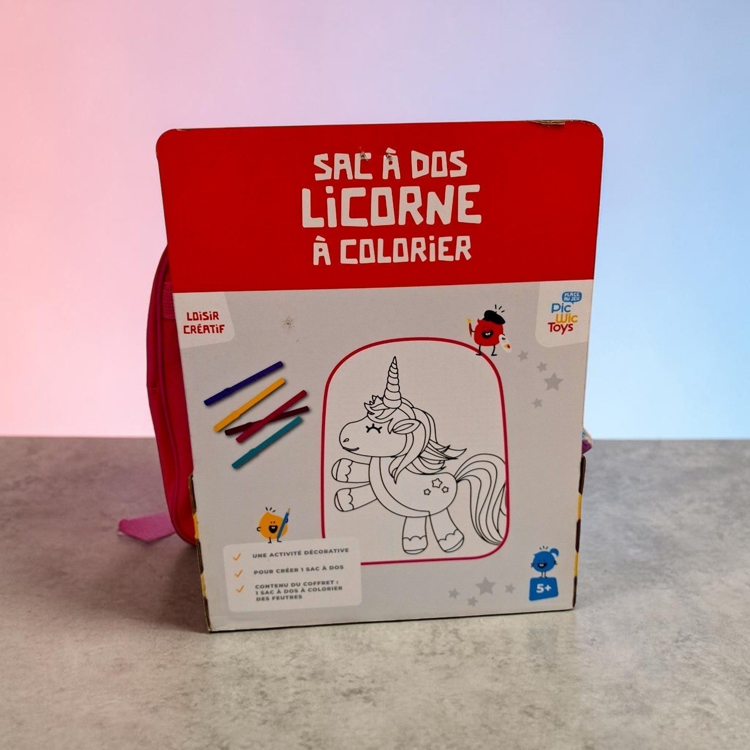 Tiny Tokens Colour Your Own Unicorn Backpack, a DIY art bag with fabric markers for kids. Features a white canvas front with a unicorn outline ready for customisation.