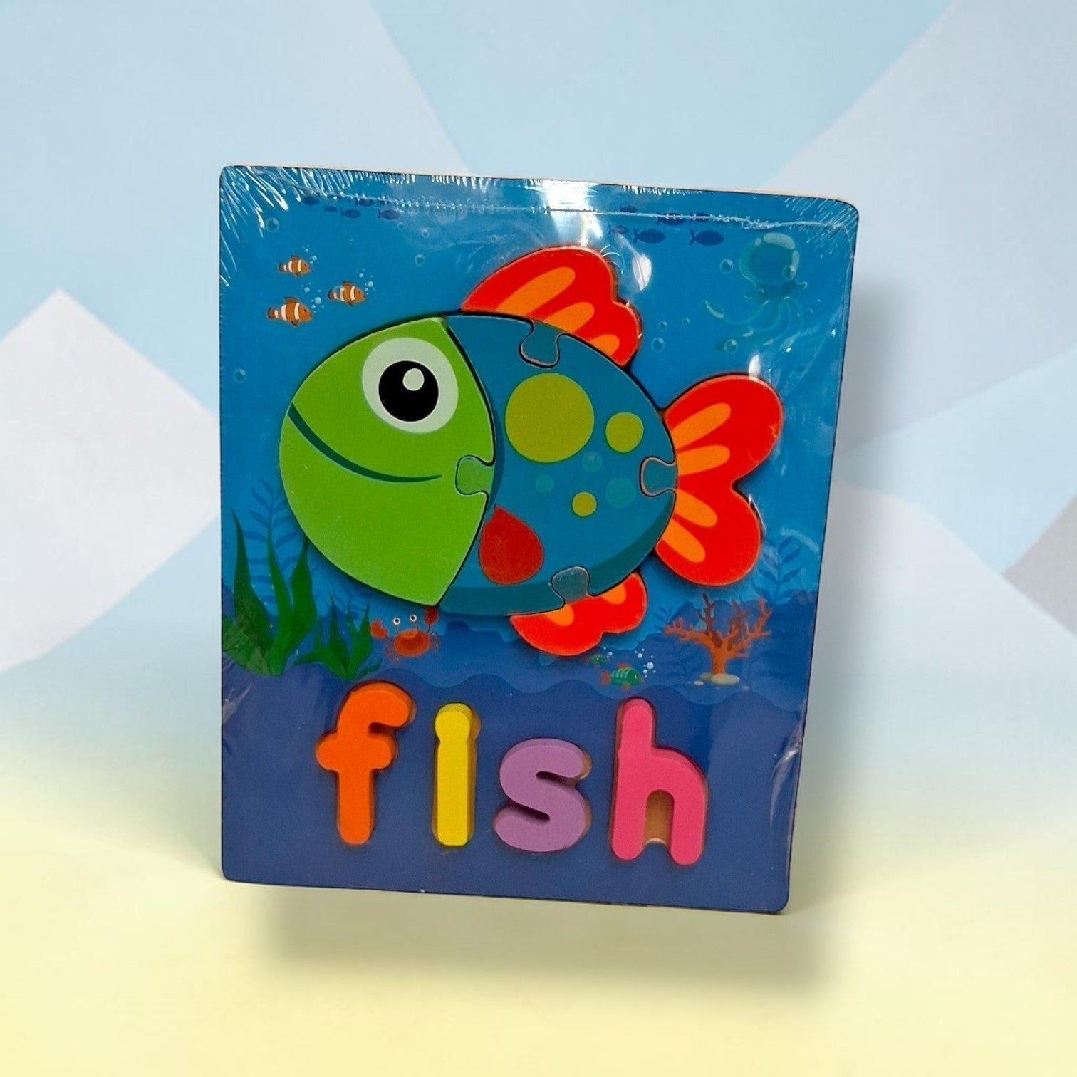 Tiny Tokens wooden fish word puzzle board with chunky, colourful letters for early literacy learning for kids aged 2-7.