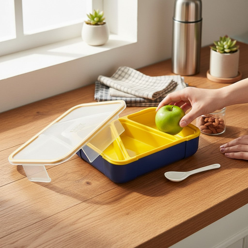 Tiny Tokens yellow and navy 3-compartment bento lunch box with transparent lid and spork. Ideal for school.