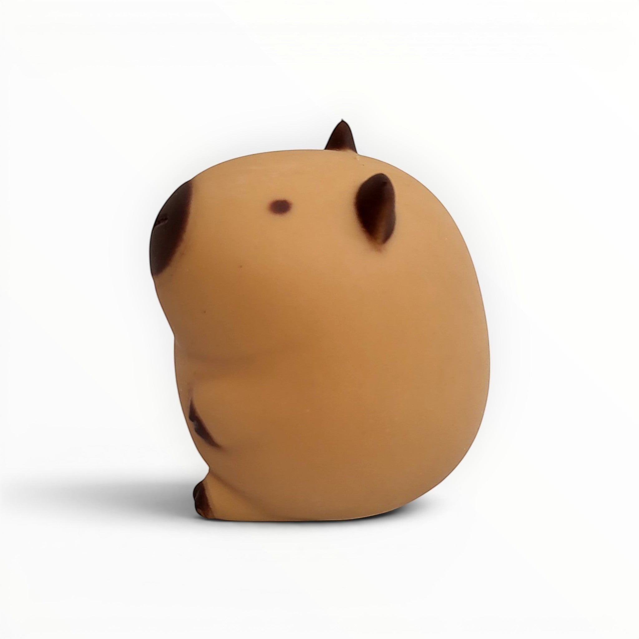Tiny Tokens brown capybara squeeze toy for kids, soft rubber sensory animal for stress relief and fidgeting.