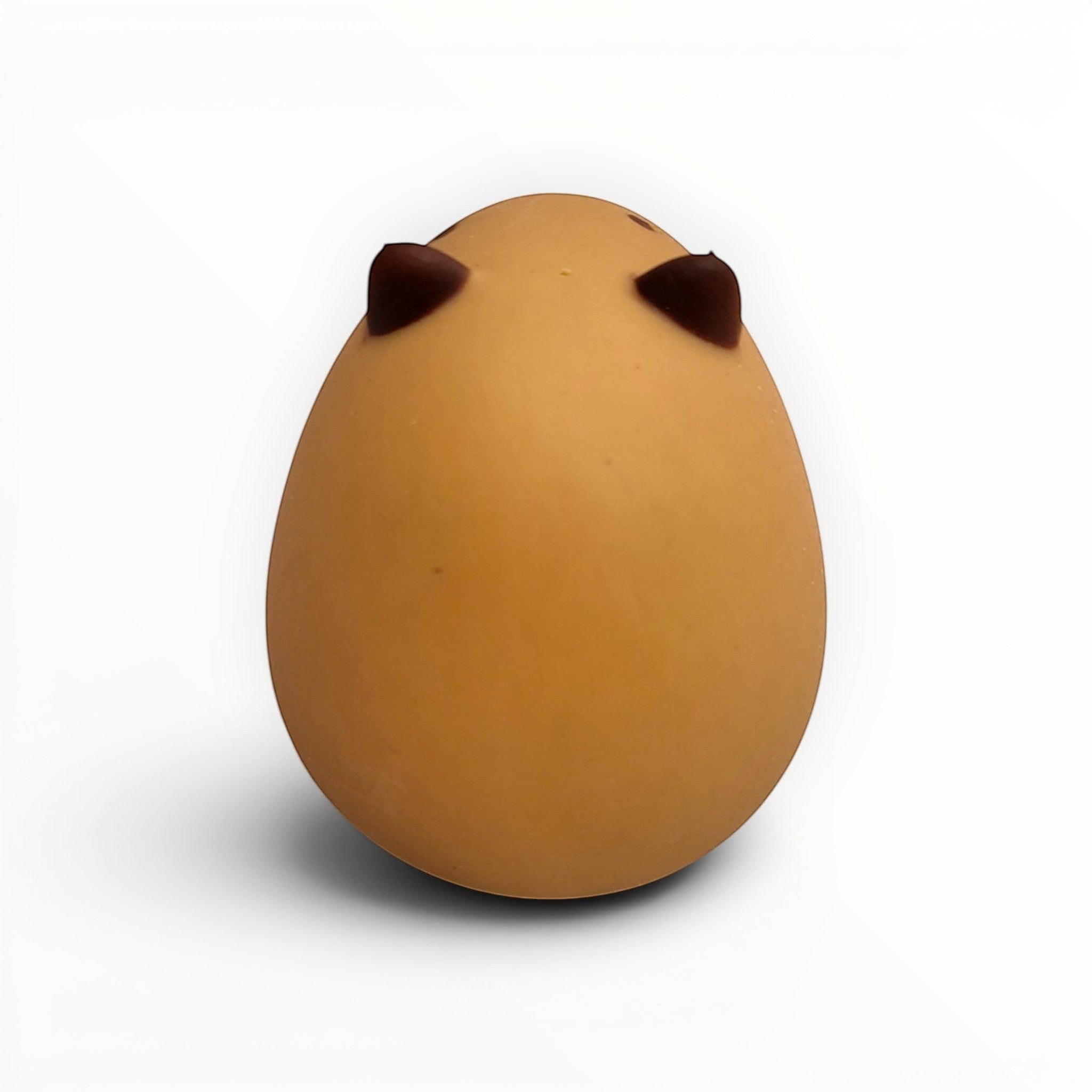 Tiny Tokens brown capybara squeeze toy, a soft rubber sensory animal for kids, perfect for stress relief and fidgeting.