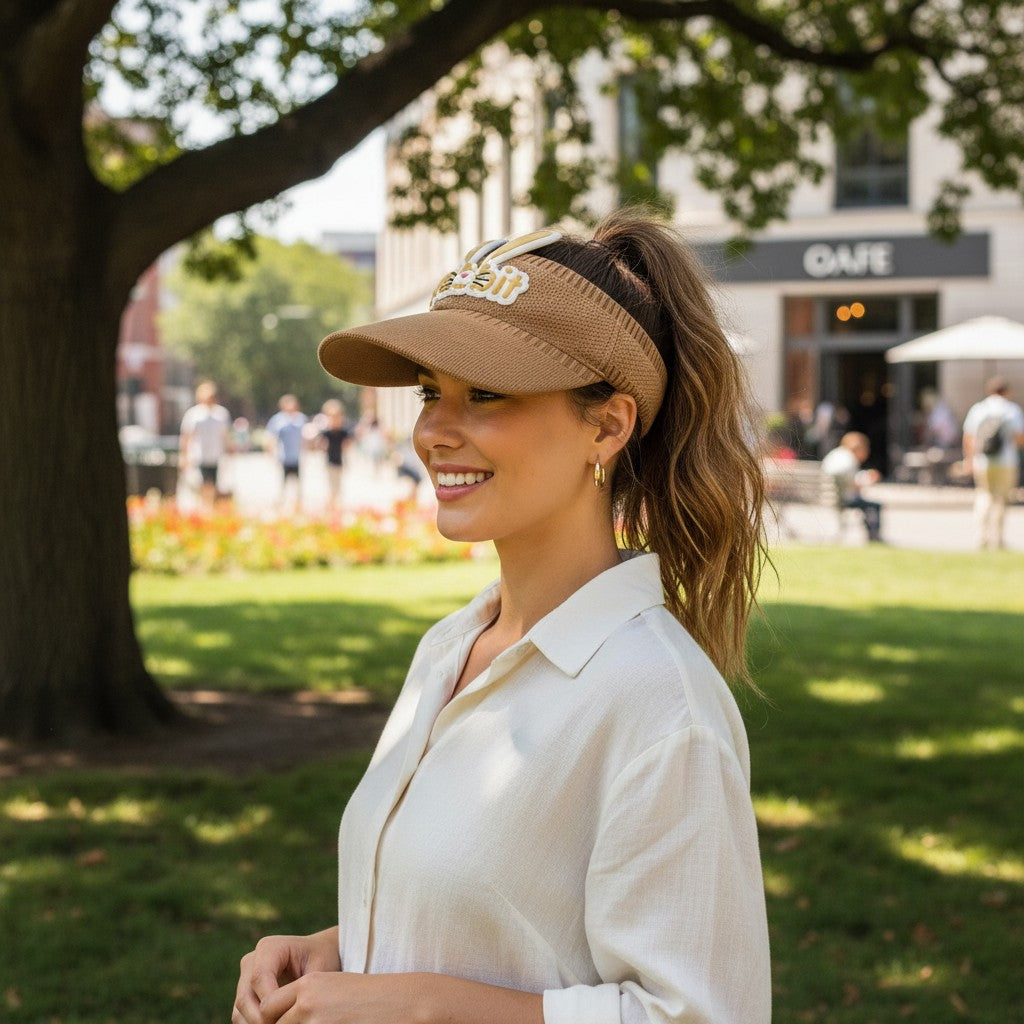 Tiny Tokens brown knit open-top sun visor cap for kids with a cute rabbit badge and ears detail.