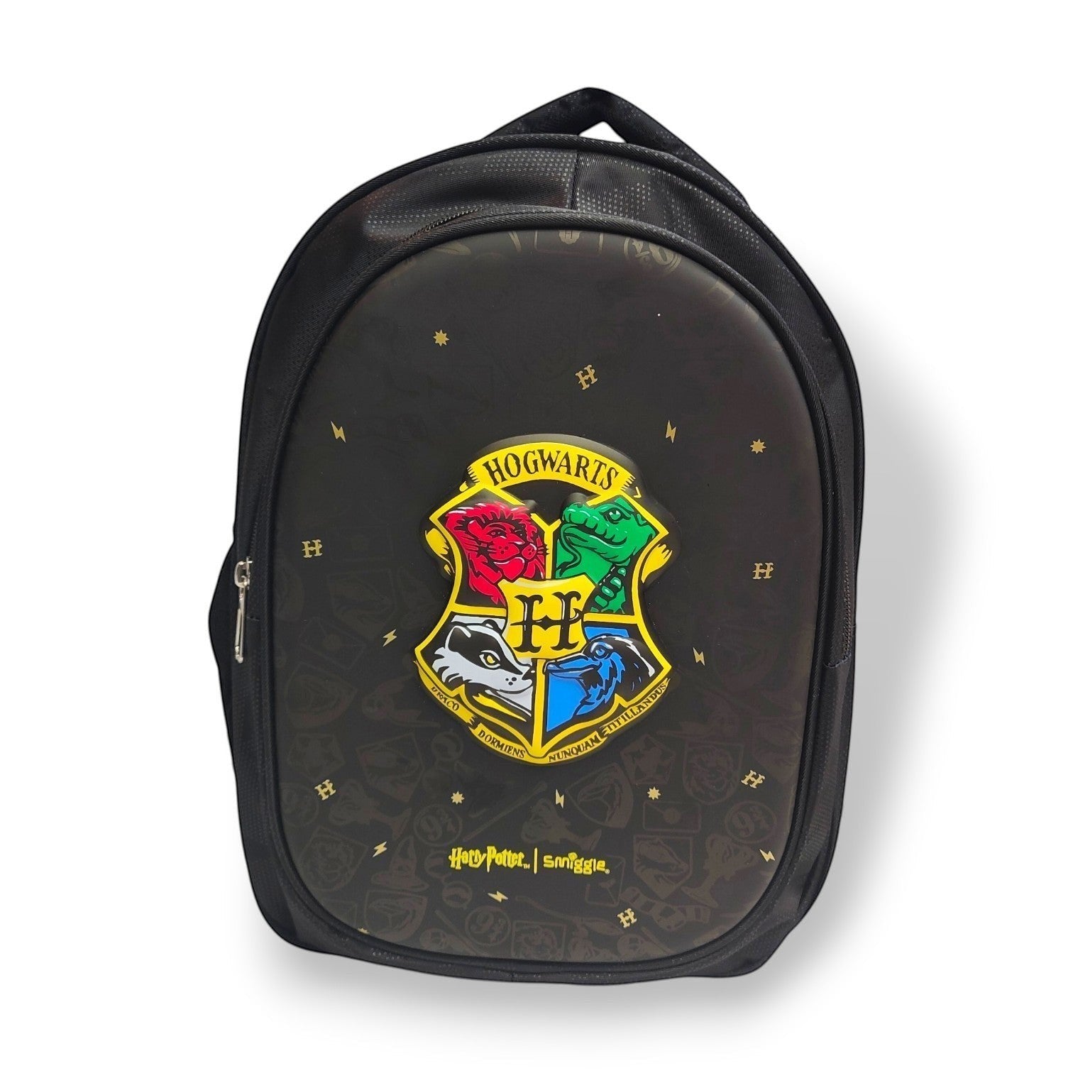 Tiny Tokens Harry Potter Hogwarts backpack in black with a hard-shell front featuring the Hogwarts crest and house emblems. Gold lightning bolts and 'H' symbols scattered across the bag.