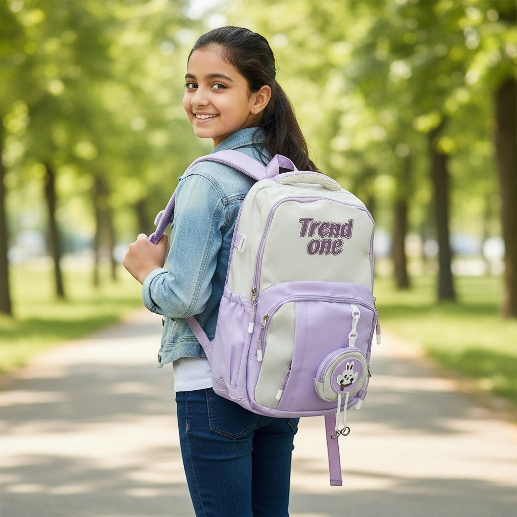 Tiny Tokens lavender and cream colorblock school backpack with cute bunny coin pouch and gold hardware.