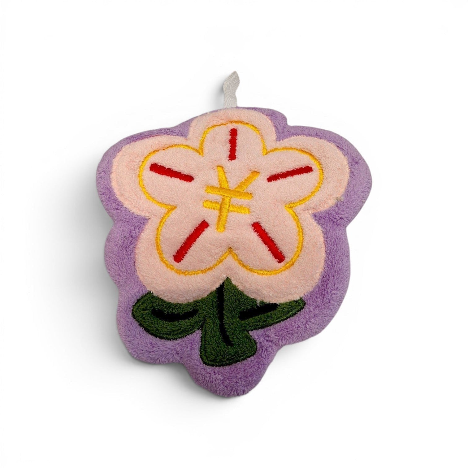 Tiny Tokens purple and pink plush flower hand towel with green leaves and embroidered details, featuring a hanging loop.