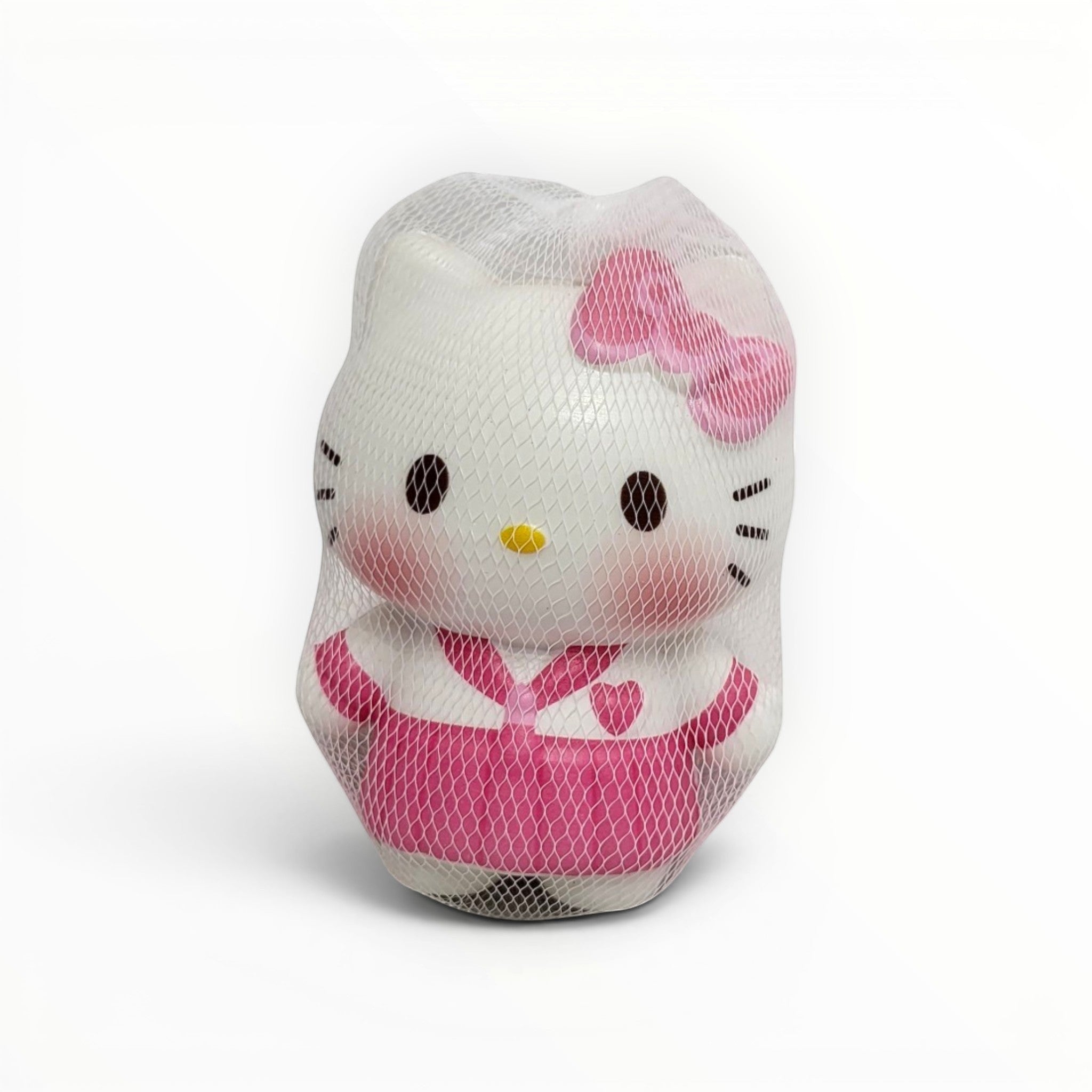 Tiny Tokens white cat squishy toy with pink bow and dress, soft rubber stress relief toy for girls.
