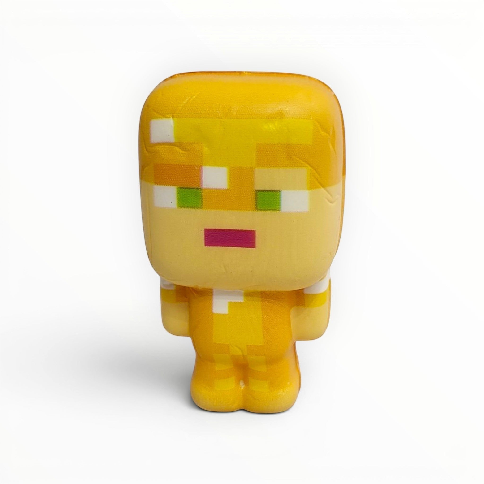 Tiny Tokens yellow pixel character squeeze toy for kids, inspired by Minecraft. Soft rubber stress relief figure.